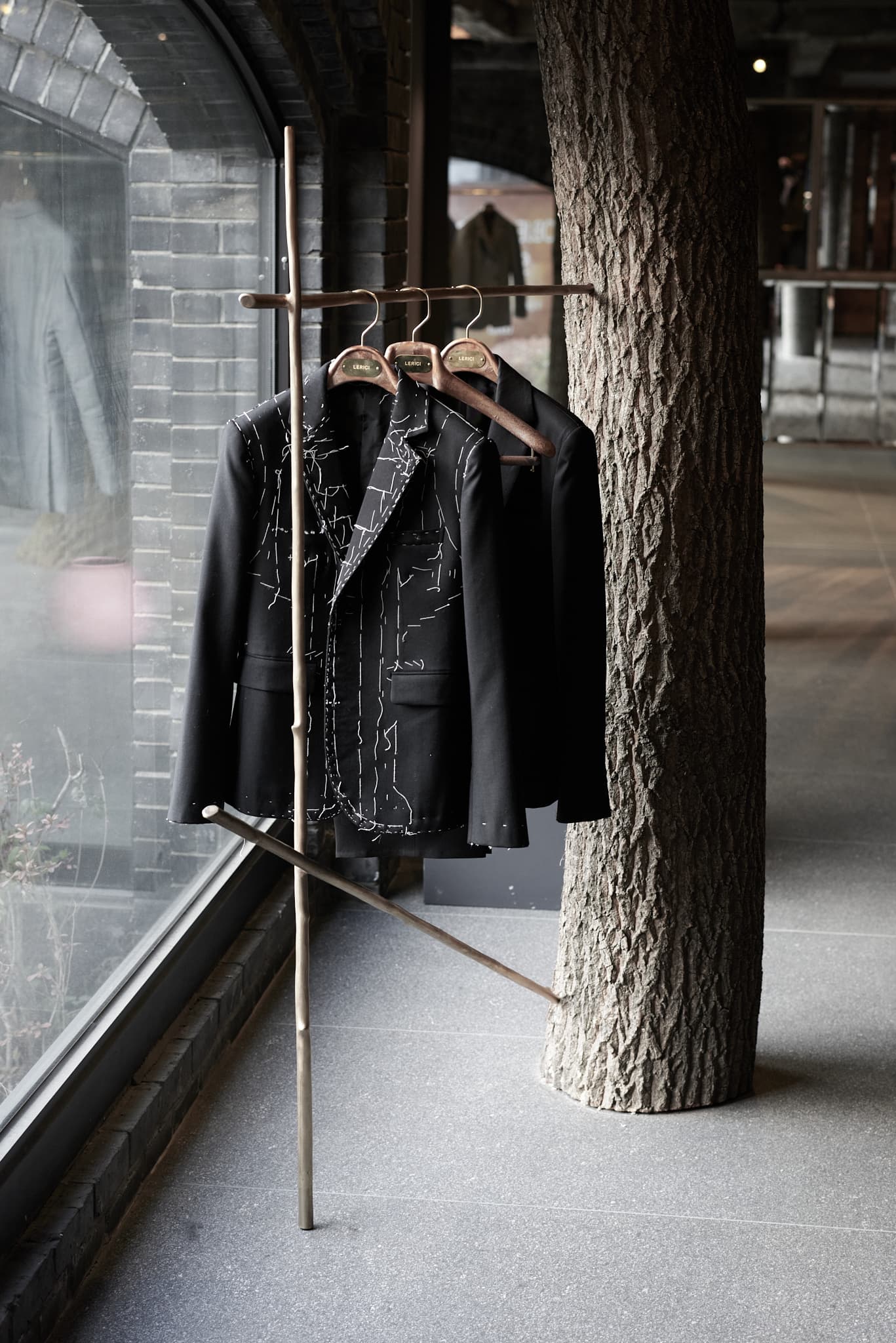 Hanger made of brass and wood